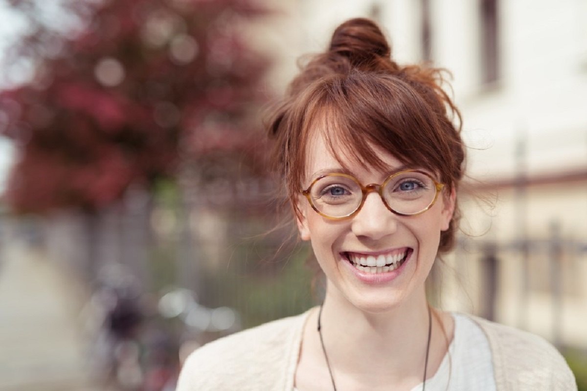 Women Wearing Brown Color Frame Glasses